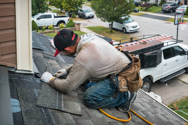 Professional Roofing technician working in Blue Mountain, MS